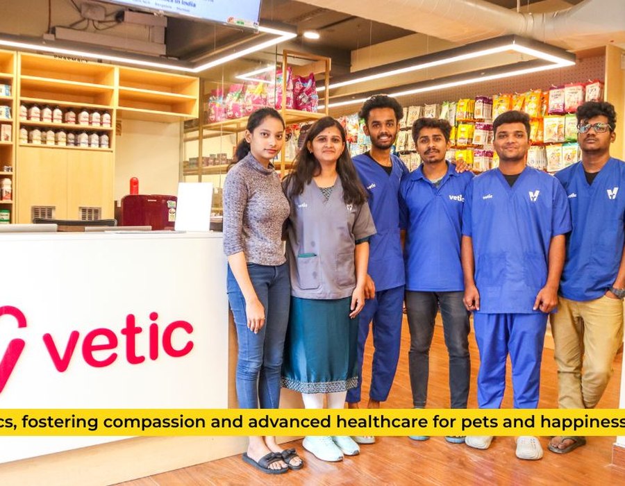 Vetic pet care hospital retail interior with staff and branding