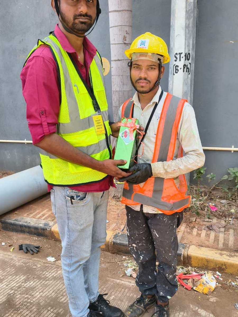 Site worker in PPE with safety harness
